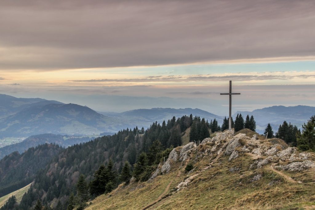 a cross on a hill