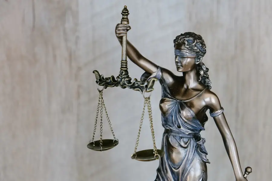 a statue of a woman holding scales