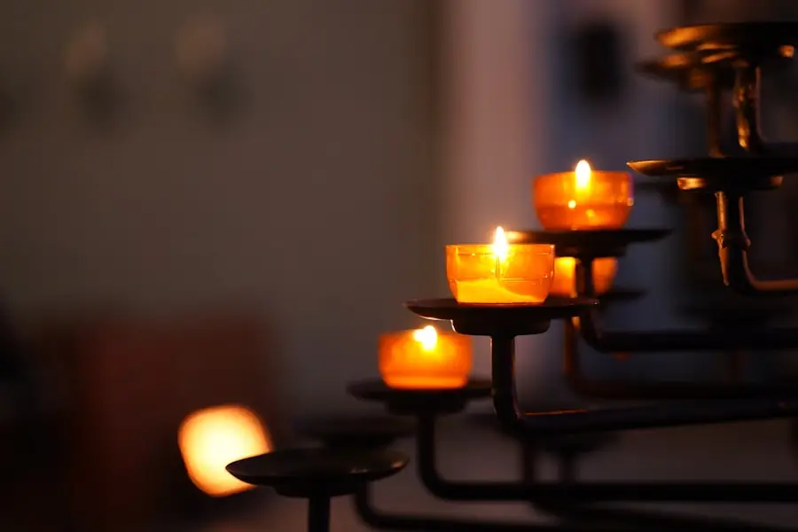 a group of candles on a black stand