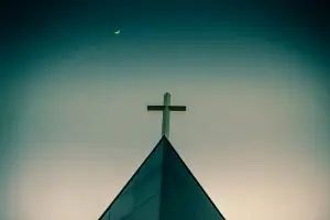 a cross on top of a building